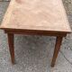 Table basse à décor géométrique noyer massif