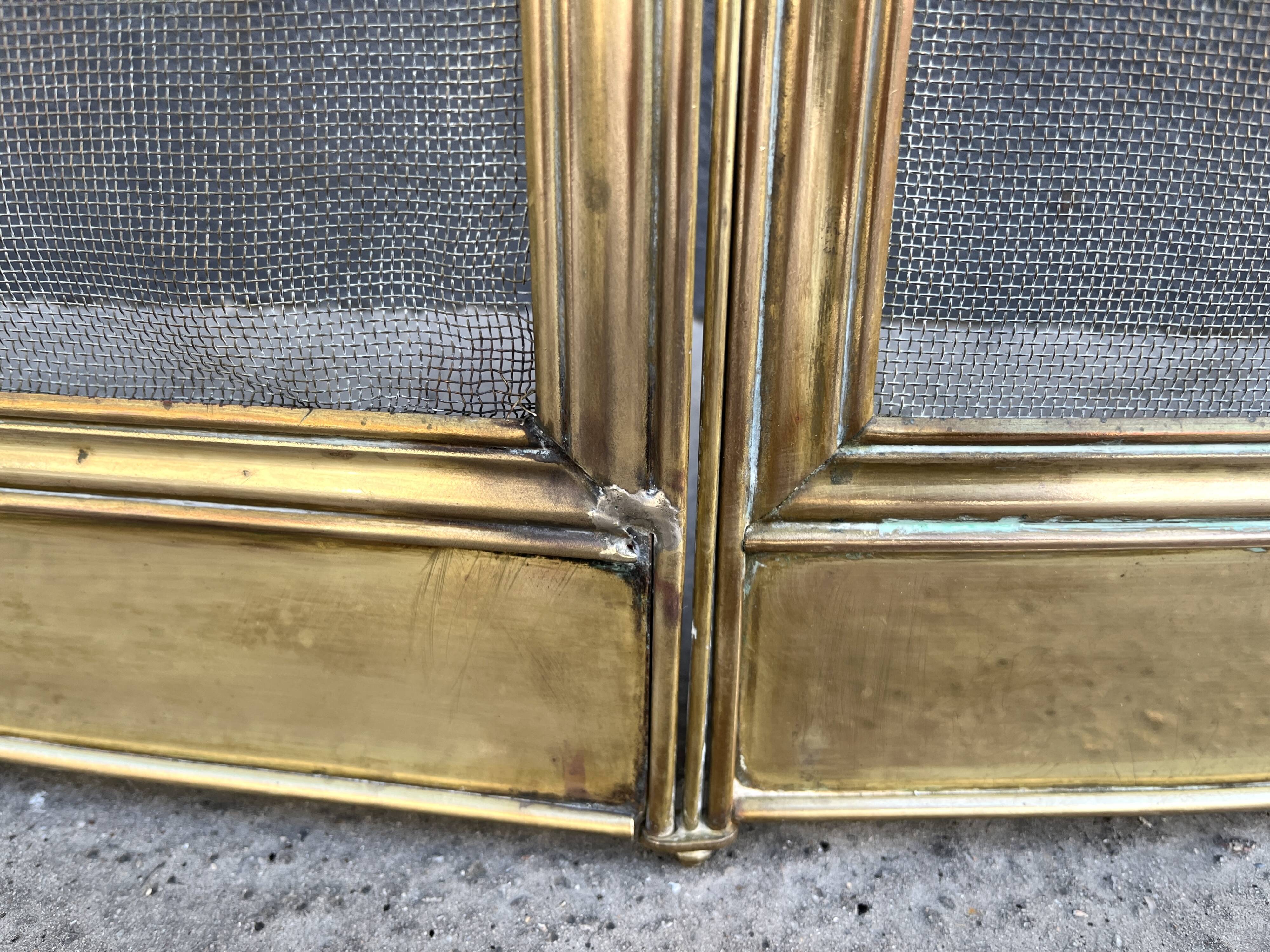 19th-century fireplace screen by Bouhon Frères in brass