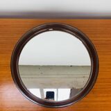 Round mirror with amber rim from the 70s, vintage