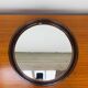 Round mirror with amber rim from the 70s, vintage