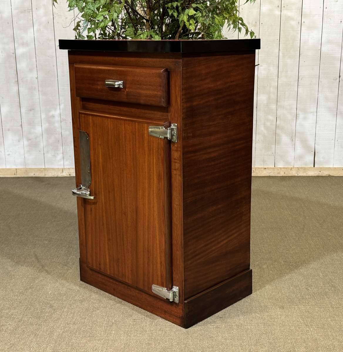 Bistro sideboard with 1 mahogany door and Formica top from the 1950s.