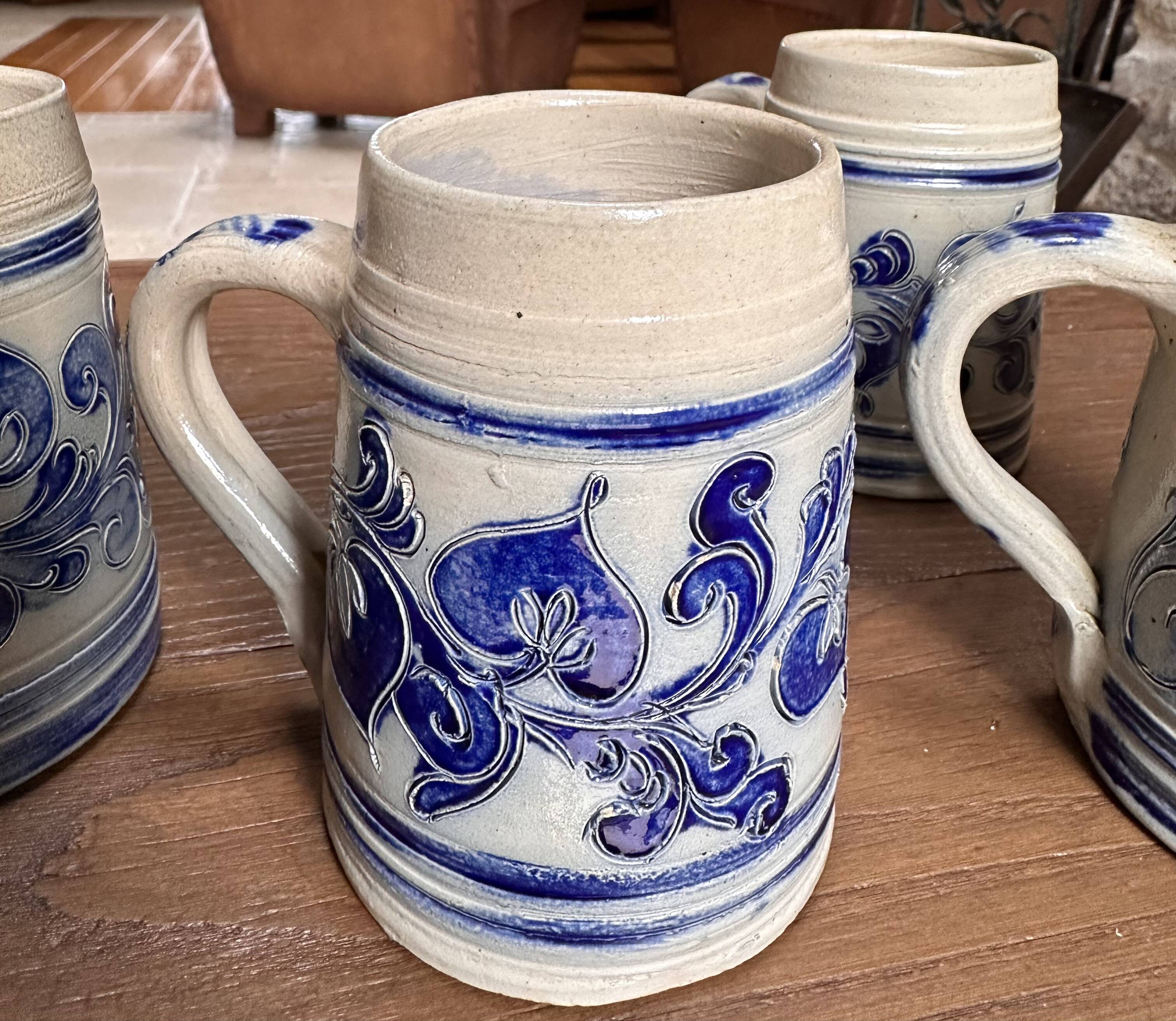 Lot of 4 Alsatian stoneware mugs signed Rémy Belsdorf.