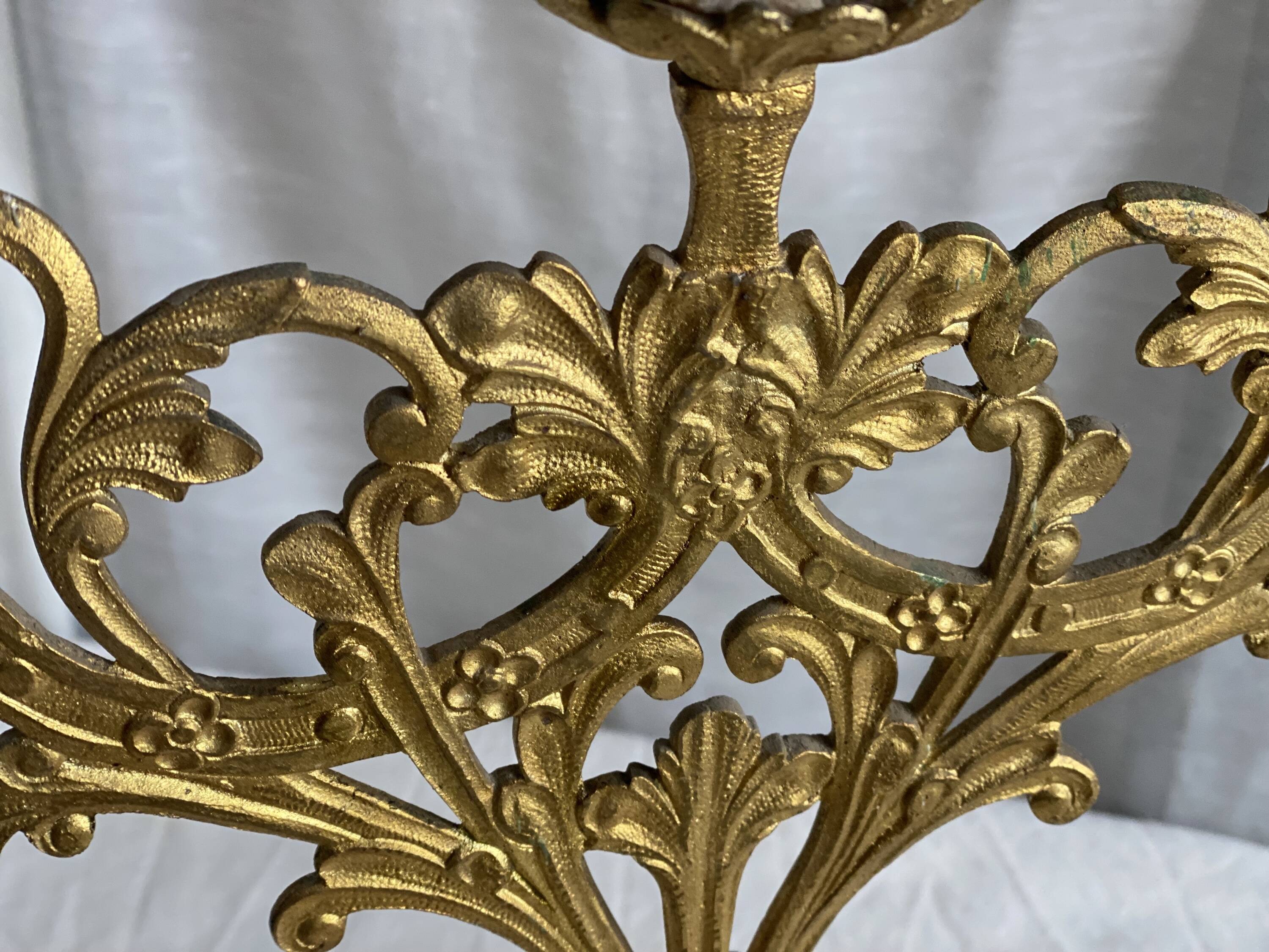 Set of 3 gilt metal candlesticks from the early 20th century.