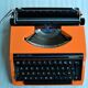 Machine à écrire Silverette orange vintage 60
