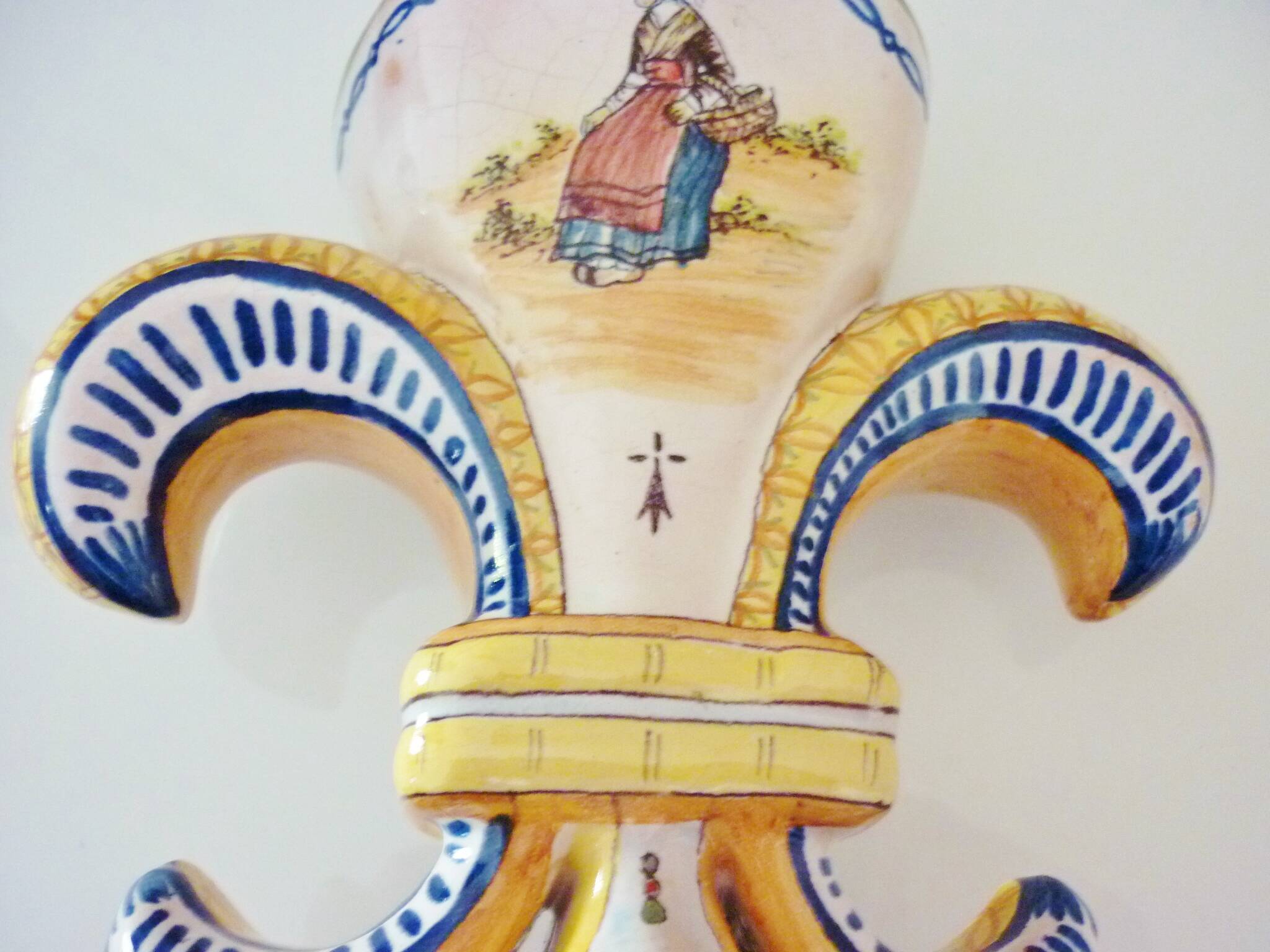 Fleur-de-lis shaped vase, glazed ceramic, Brittany, Quimper, Breton ermines, character