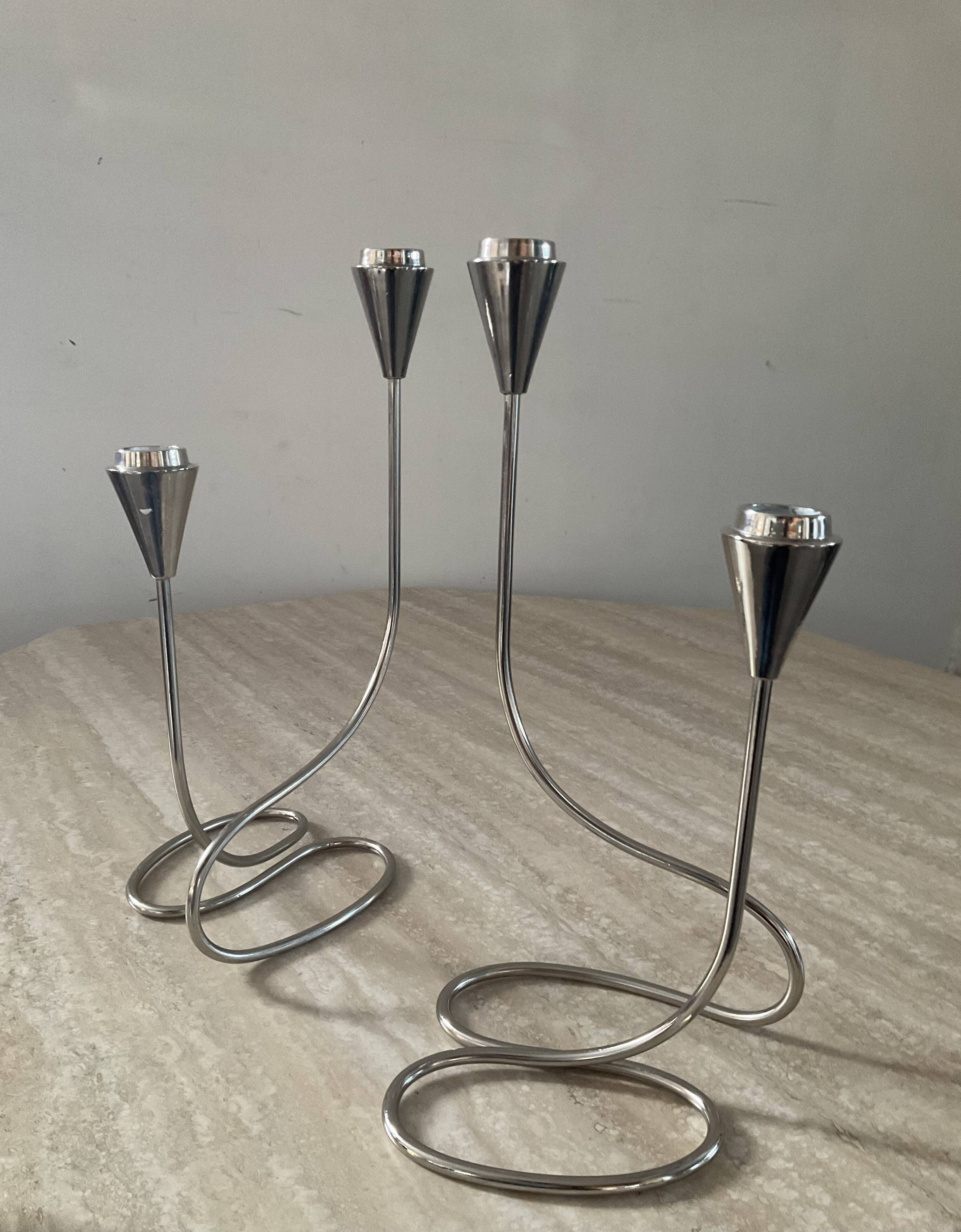 Pair of modernist silver metal candlesticks