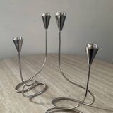 Pair of modernist silver metal candlesticks