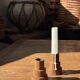 Pyramidal circular teak monoxyle candlestick H7 D5