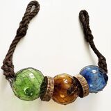 Fishing floats made of blown glass, cork, and rope. France, 1960s.