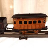 Small JEP mechanical train, including locomotive, tender, sleeping car, rail, 1930s