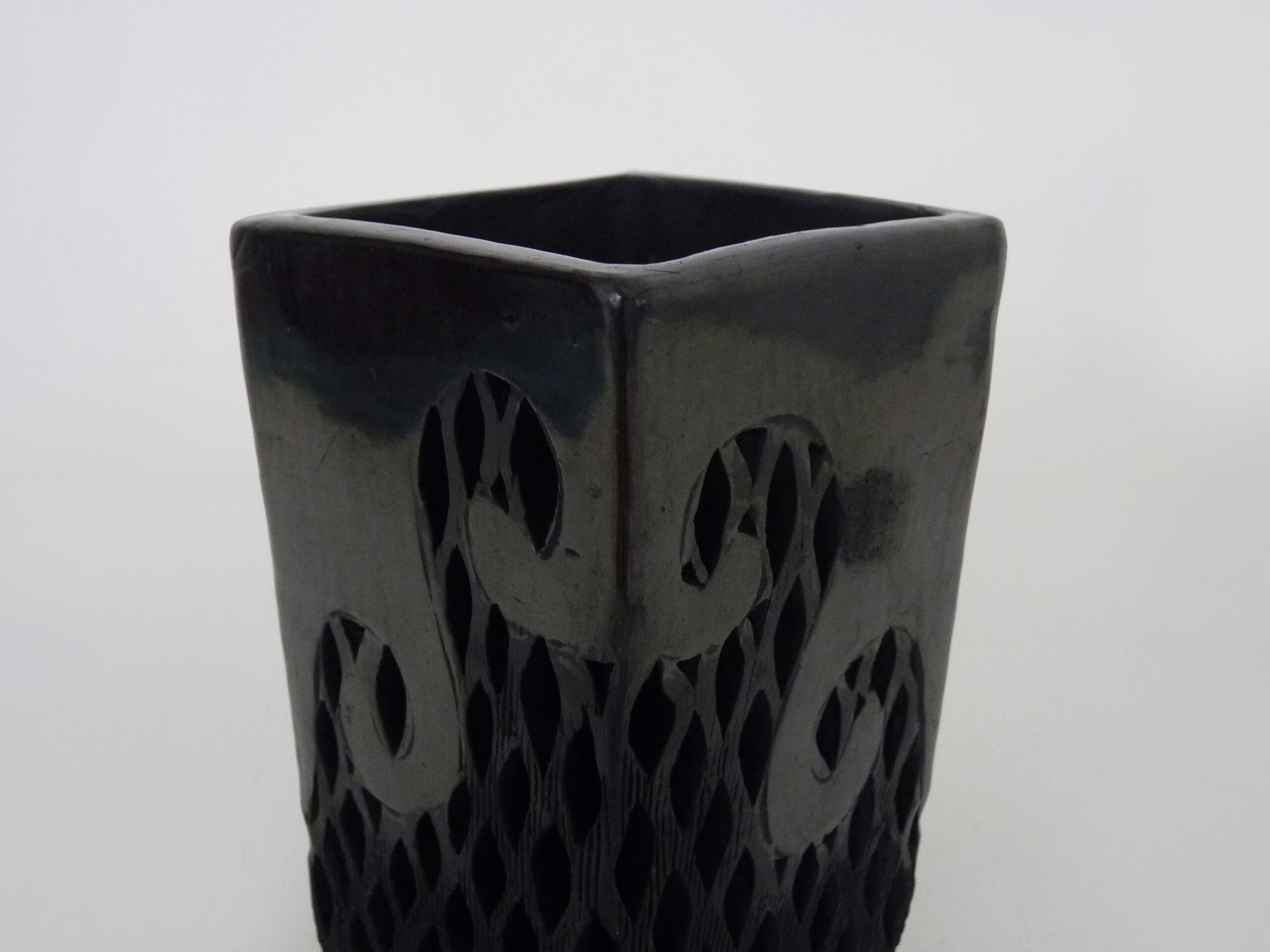 Vase Dona Rosa Oaxaca Mexico black openwork. Mexican folk art. Year 70