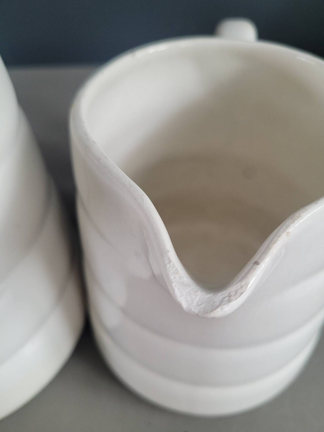 Pair of antique Gien porcelain pitchers