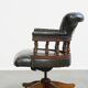 Green leather height-adjustable, swivel and tilt chesterfield office chair