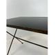 Modernist nesting tables in metal and black glass, 1950s.