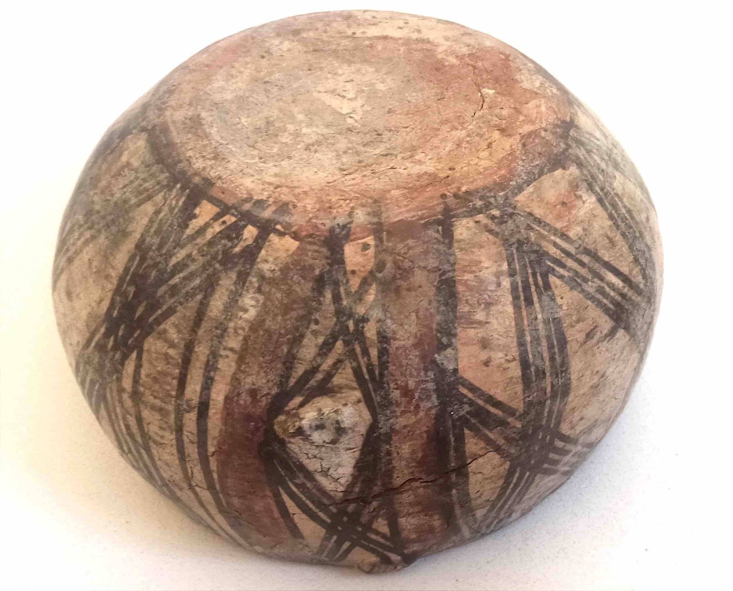 Large ethnic style bowl in orange terracotta, early 20th century