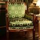 Fauteuil de style Empire en bois et tissu vert