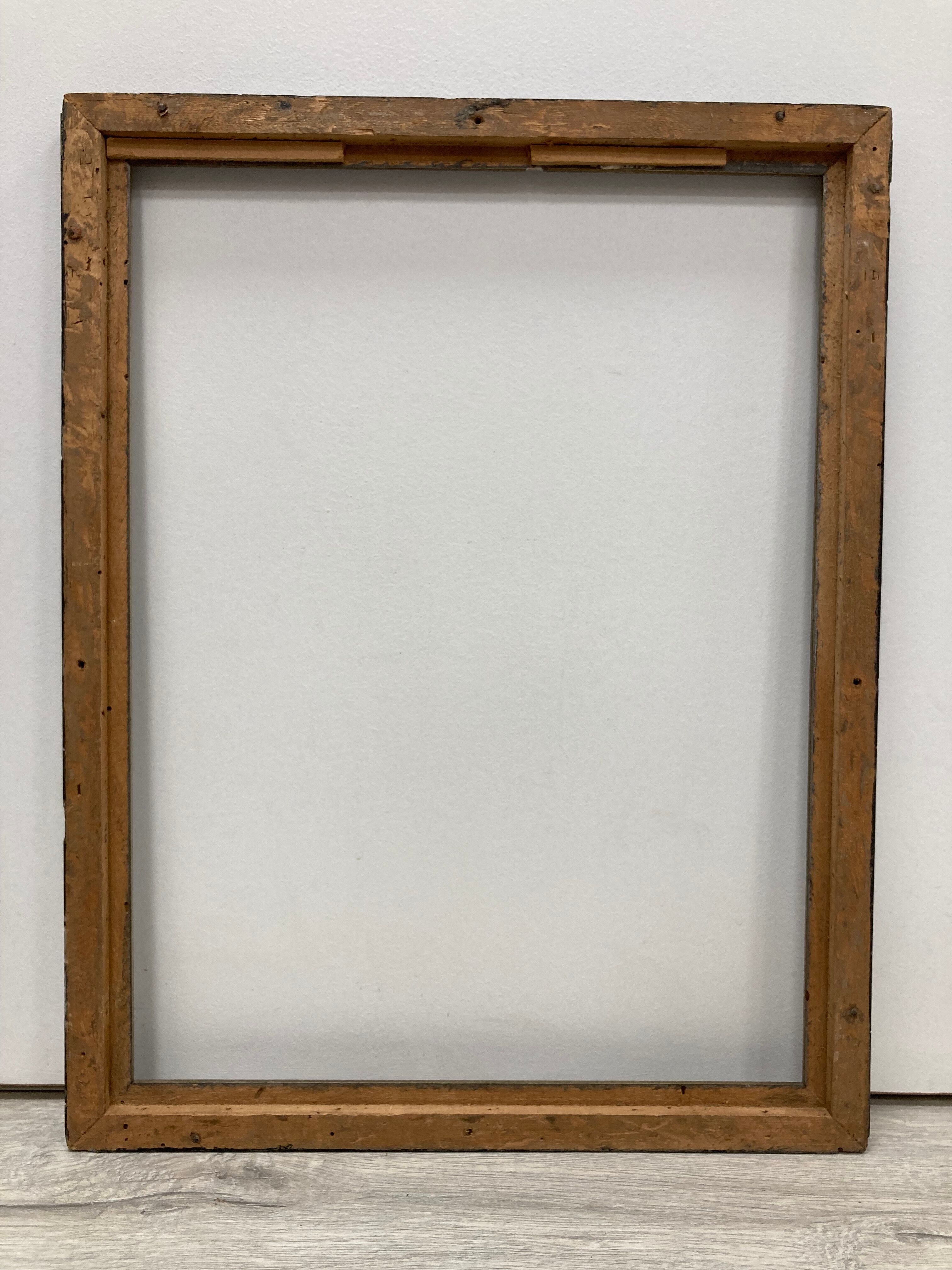 Black and gold frame decorated with Greek frieze decoration