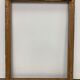 Black and gold frame decorated with Greek frieze decoration