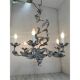 Contemporary brunish-clay florentine wrought iron leafs chandelier