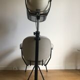 Vintage hairdresser's armchair with helmet transformed into a lamp