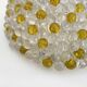 Pair of vintage wall lights with yellow and transparent beads. 70s