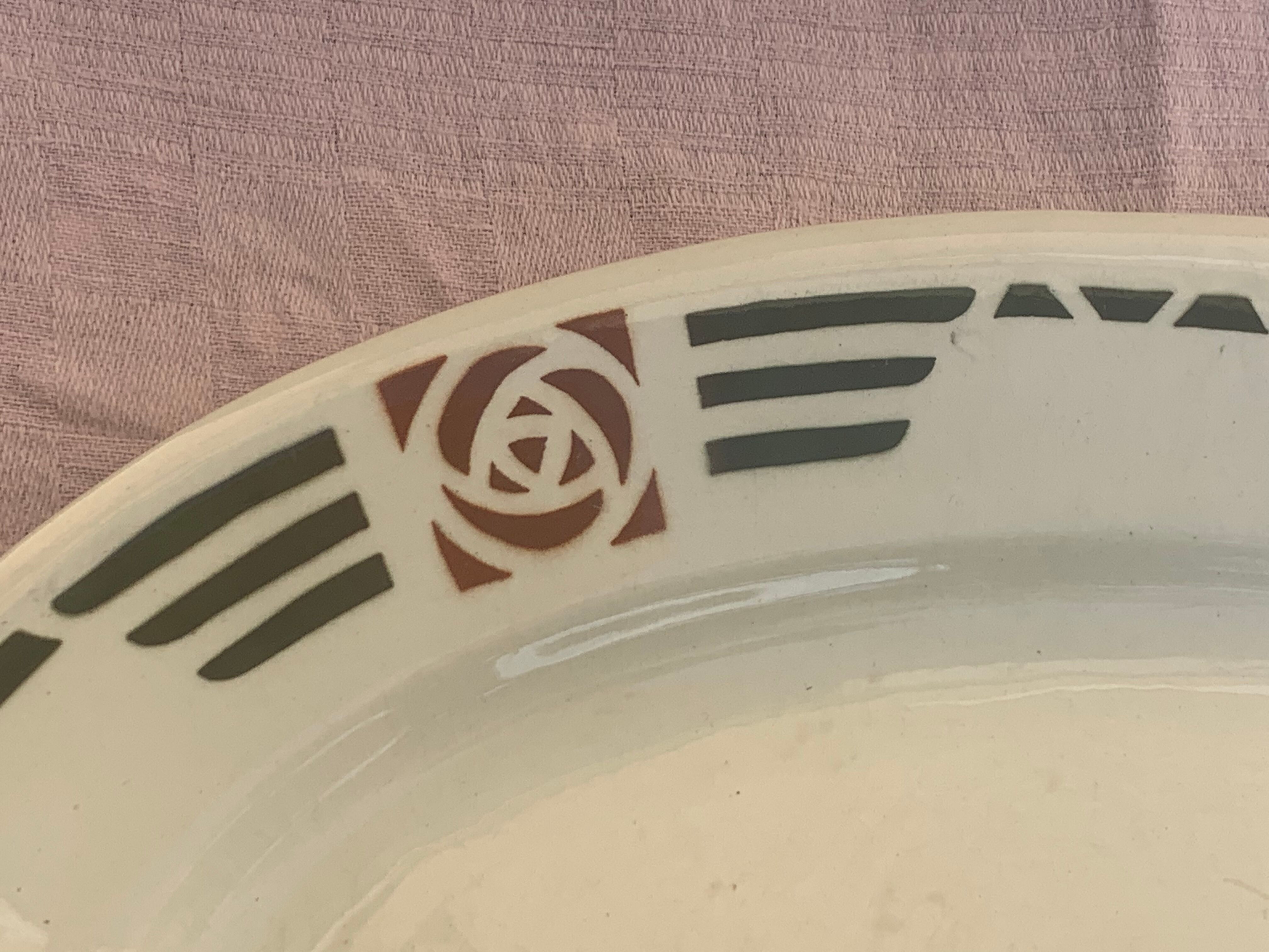 Serving dish in charcoal earthenware model Courbet art deco