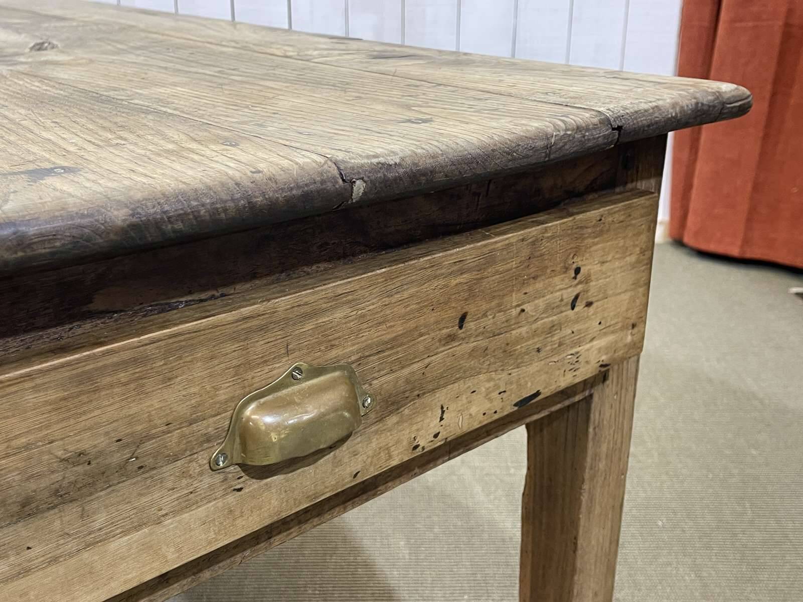 19th century farmhouse table in raw chestnut with original drawer and shelf