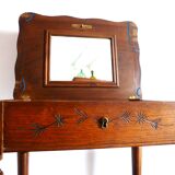 Vintage 1920s wooden dressing table with mirror and storage.