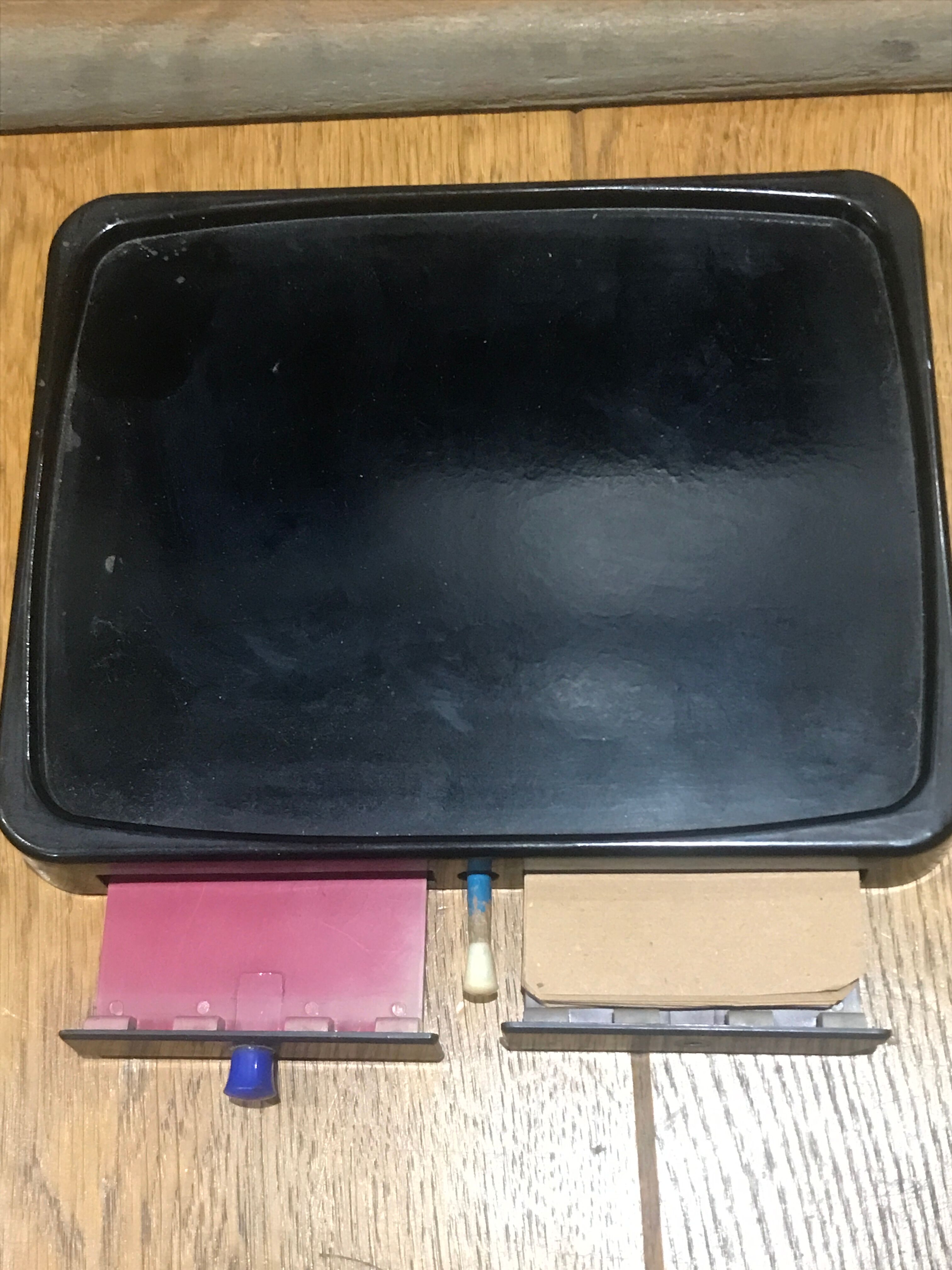 Black bakelite dial telephone with support