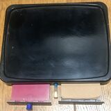 Black bakelite dial telephone with support