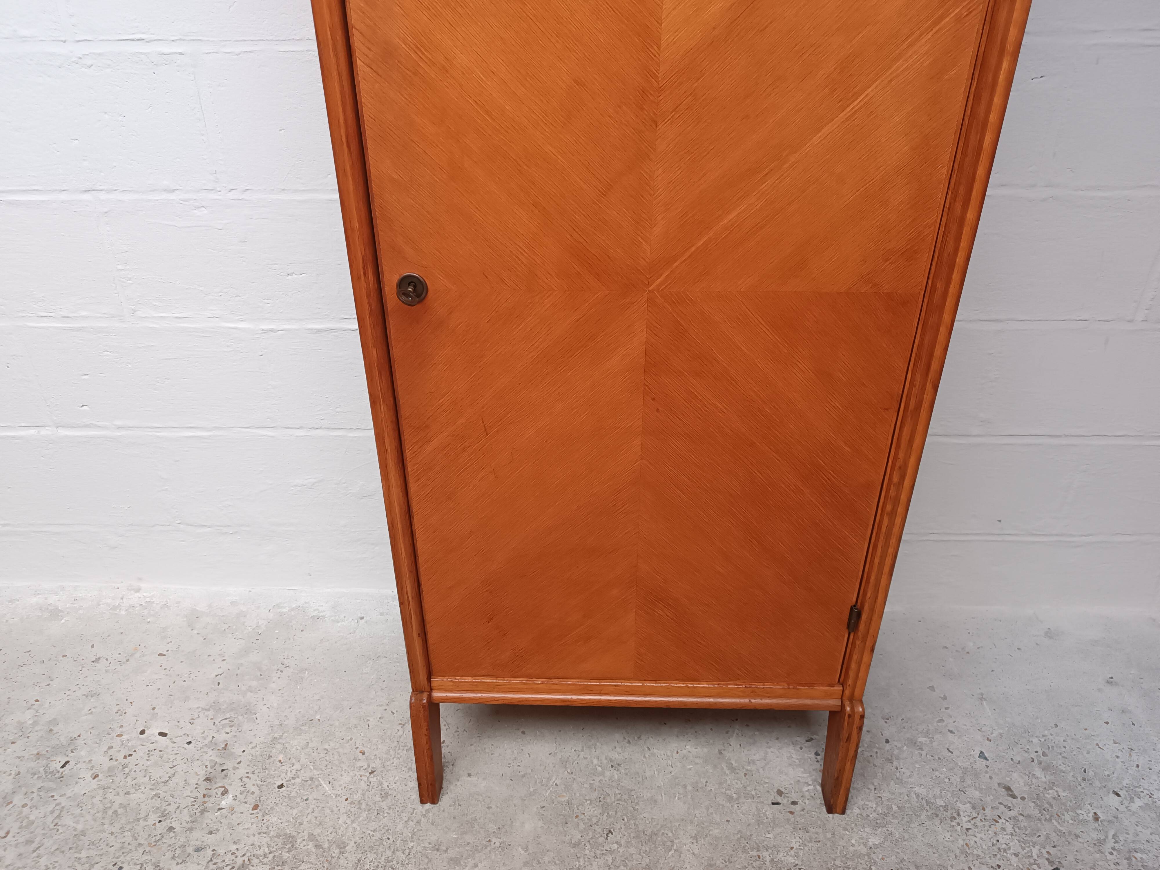 Wing-shaped locker cabinet from the 1950s