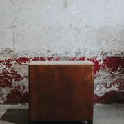 Black and natural wood chest of drawers with 4 drawers
