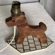 Vintage 1970s polychrome wooden lamp in the shape of a dog.