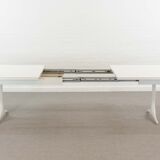 Extendable pedestal dining table by George Nelson for Herman Miller