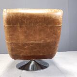 Vintage leather swivel chair with stool, 1970s
