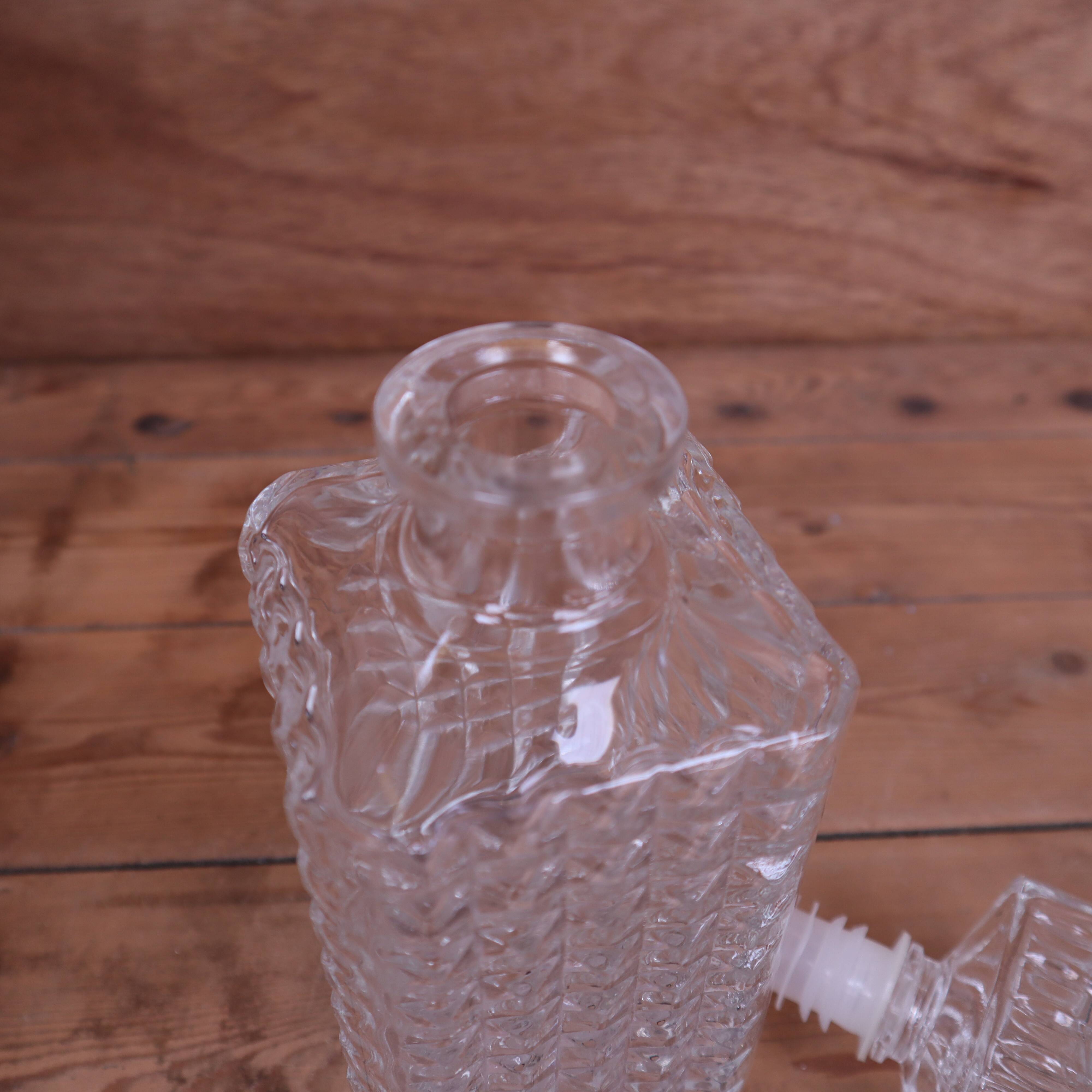 Vintage cut glass whisky decanter with diamond point design, 1960s.
