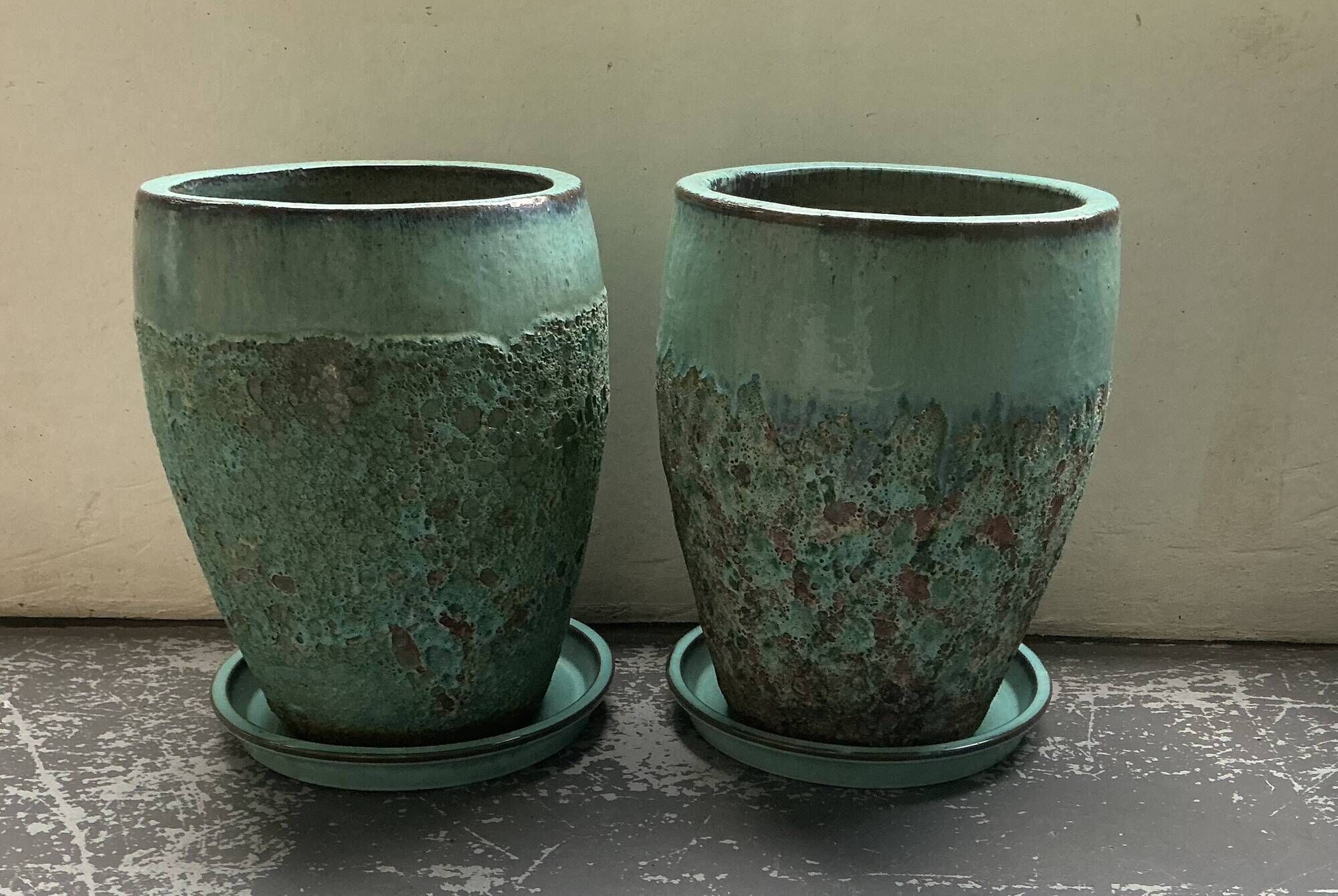 Set of 3 large blue glazed stoneware pots.