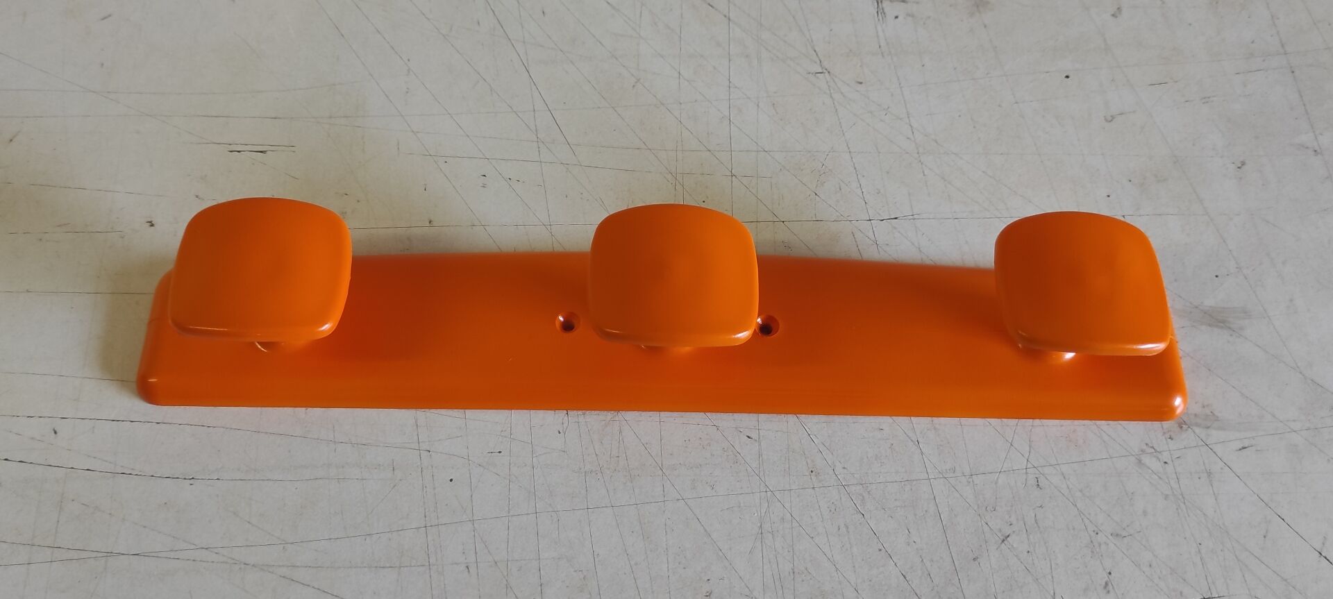 Orange wall coat rack by Syla - 1970s