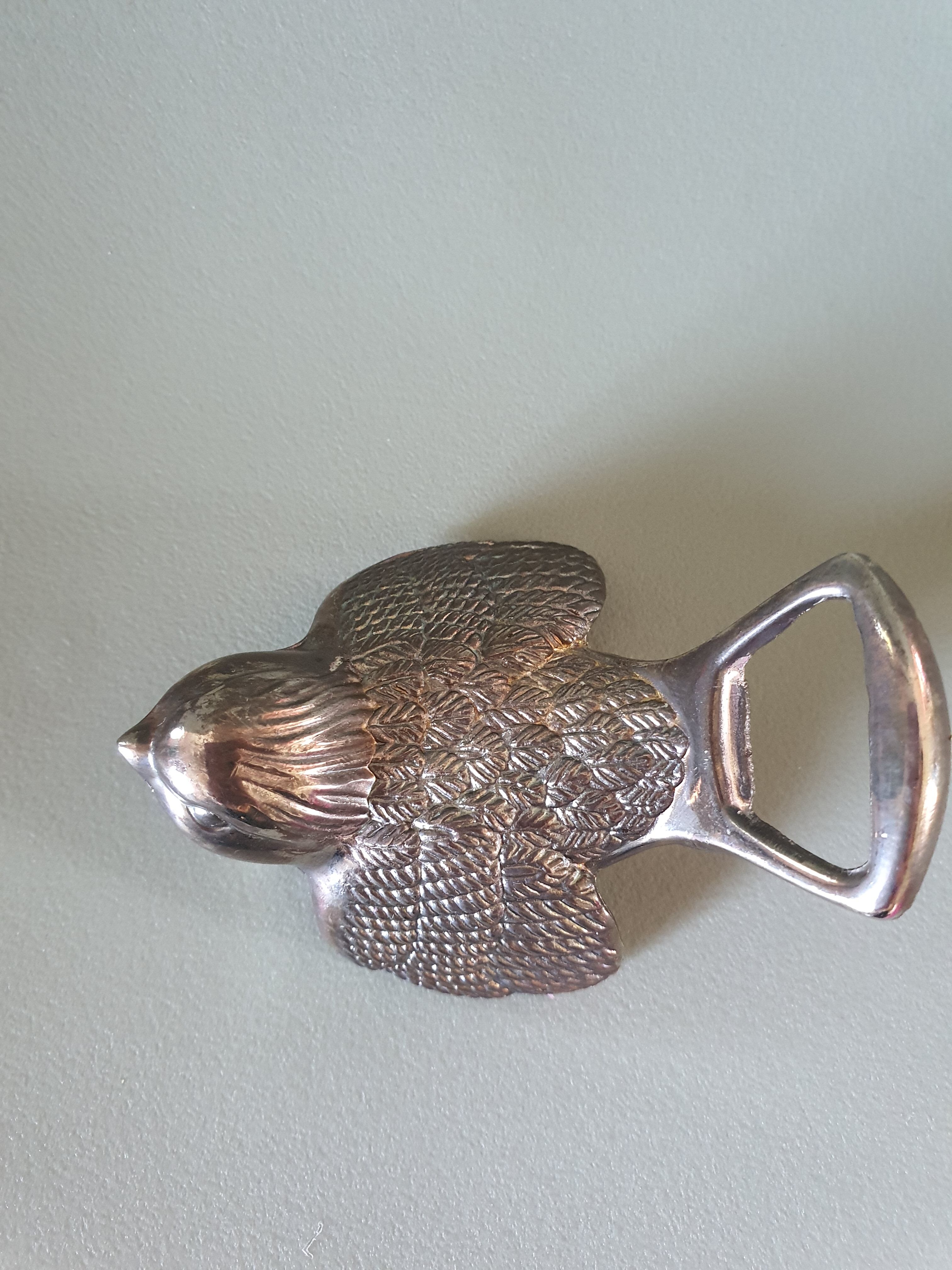 Vintage metal bird bottle opener