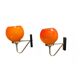 Pair of wall sconces with orange opaline globes and gold metal.
