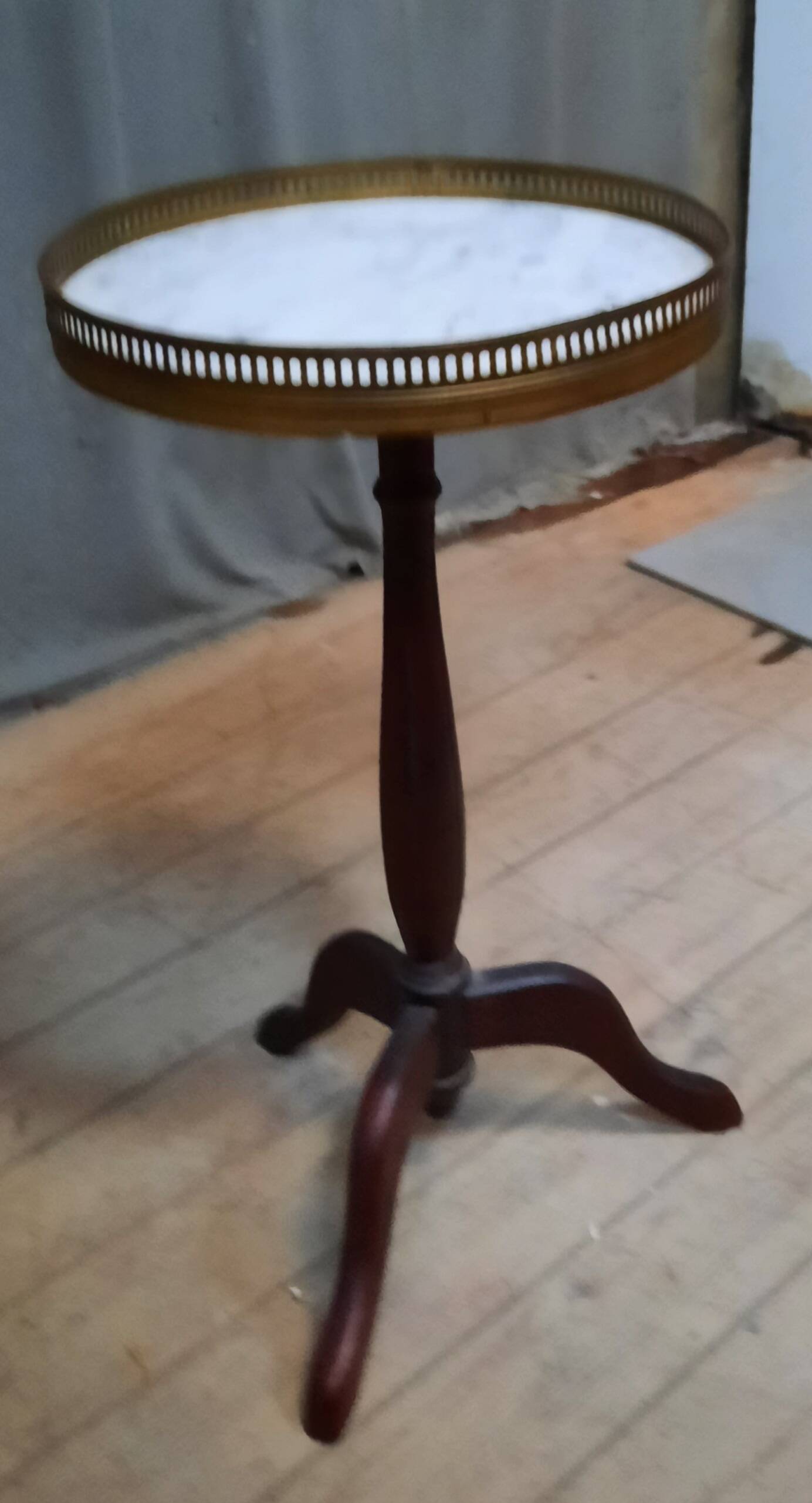 Small marble top pedestal table