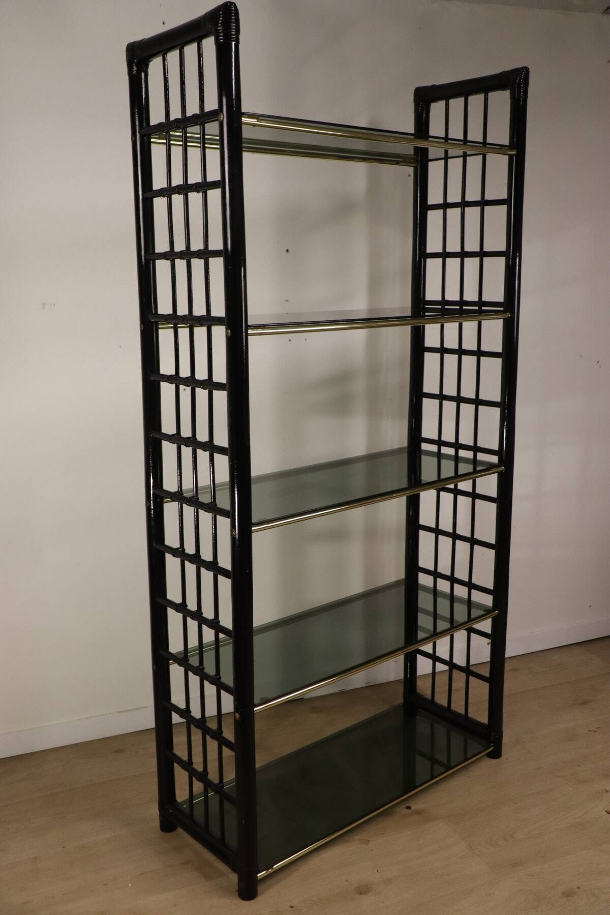 Vintage 1970s shelf in smoked glass with a bamboo-style structure.