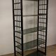 Vintage 1970s shelf in smoked glass with a bamboo-style structure.