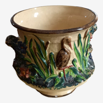 Cache pot en barbotine motif oiseaux petit éclat sur bordure marron du pied