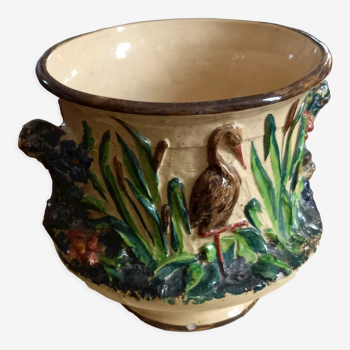 Pot cover in slip pattern birds small shine on brown border of the foot
