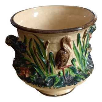 Pot cover in slip pattern birds small shine on brown border of the foot