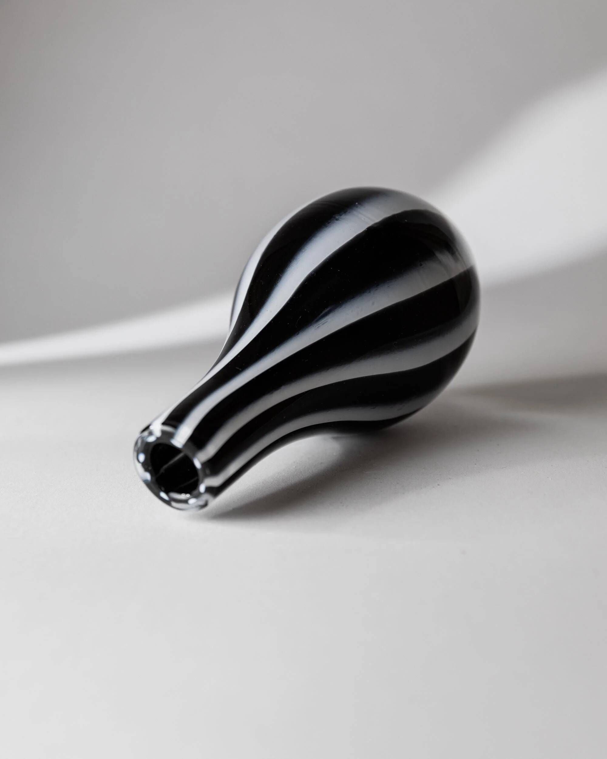 Vintage Murano glass vase from the 1980s, black and white swirl pattern, thick Italian art glass.