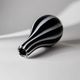 Vintage Murano glass vase from the 1980s, black and white swirl pattern, thick Italian art glass.