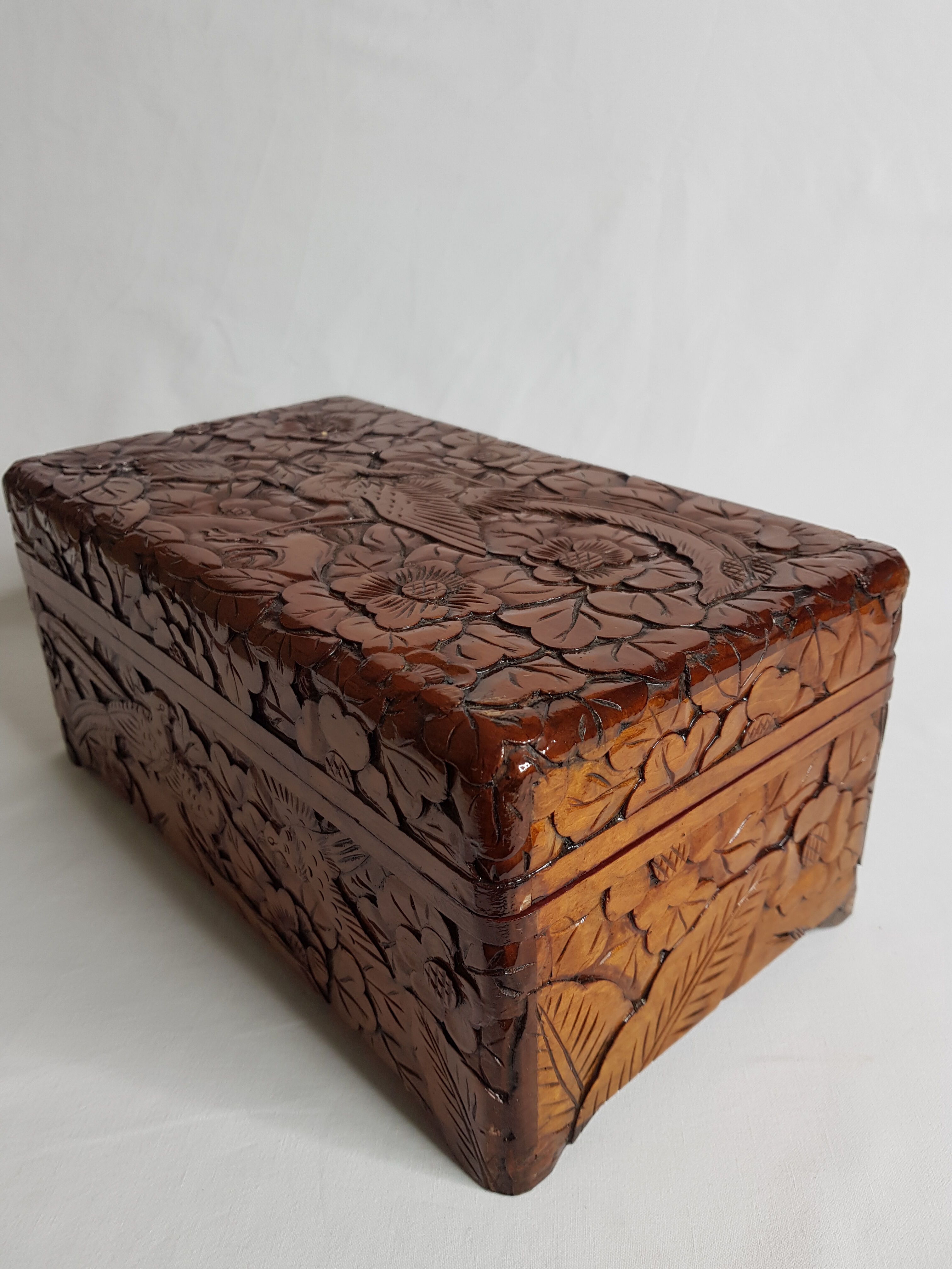 Old wooden box carved in Dodin around 1950 decorated with Phoenix