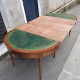 Round table with Louis XVI style extensions